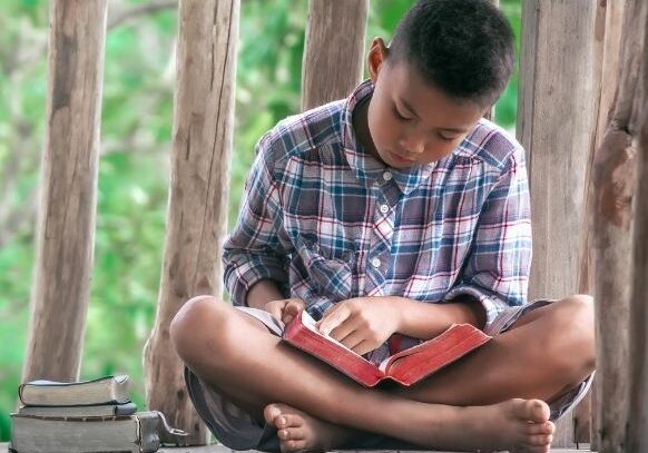 boy reading bible